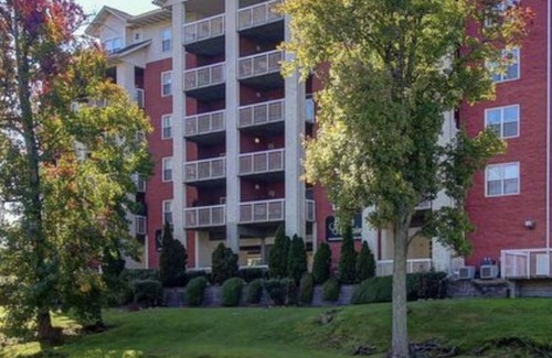 Pigeon Forge Condo | Riverside condo downtown Pigeon Forge, short walk to LeConte and The Island.