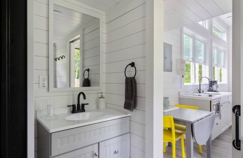 Johnson Cabin | Riverside Tiny House with hot tub near Stowe