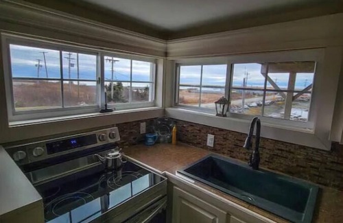 Pubnico Cottage | Rolling Waves Ocean View Retreat. Escape to peace and tranquility.