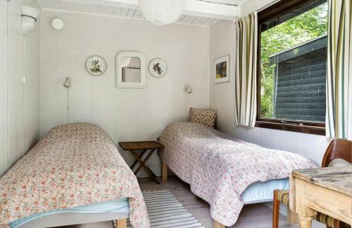 Rrvig House | Romantic Cottage Amidst Tall Woodland Trees