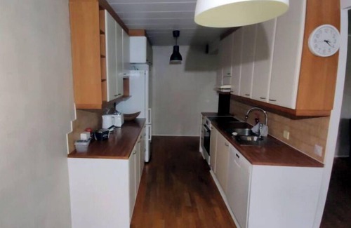 Rauma House | Row House with relaxing terrace in the garden