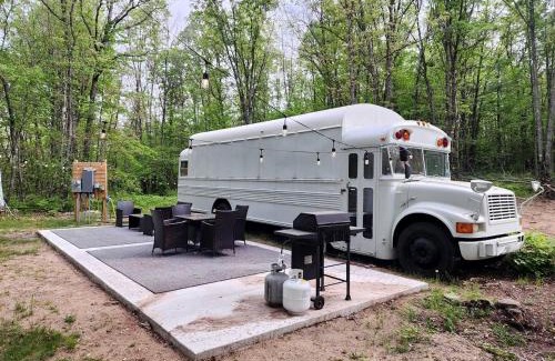 Bitely House | Rustic Converted School Bus with Outdoor Shower Near ORV Trails in Manistee National Forest, Michigan