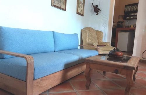 El Guincho Apartment | Rustic holiday home with small patio-terrace