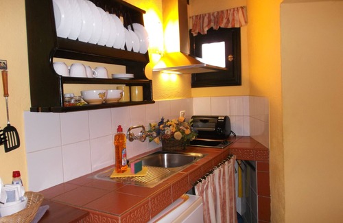 El Guincho Apartment | Rustic holiday home with small patio-terrace