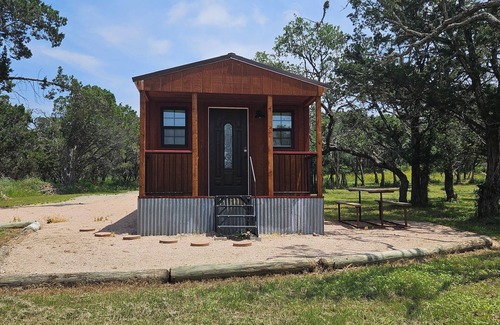 Silver Creek Village Cabin | Rustic one room cabin overlooks Lake Buchanan near Reveille Ranch and Spider Mtn