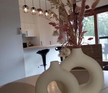 Geel Ski Chalet | Rustig gelegen chalet Kapeki met tuin aan het water
