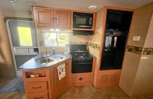 New Smyrna Beach House | RV NSB Sun & Shade Tree, Pool & Picnic RV Vacation