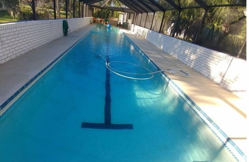 New Smyrna Beach House | RV NSB Sun & Shade Tree, Pool & Picnic RV Vacation