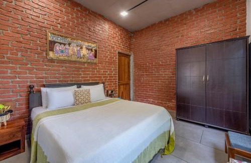 Nagaon Villa | SaffronStays Atmos The Brick House
