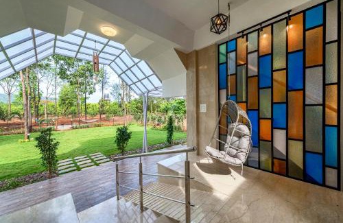 Karjat Villa | SaffronStays Casa De Familia, Karjat - pool villa with ample open space for outdoor games