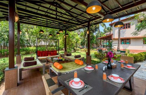 Alibaug Villa | Saffronstays Casa Del Palms, Alibaug - luxury pool villa with chic interiors, alfresco dining and island bar