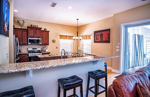 Vilano Beach House | Salt water pool - jacuzzi - BBQ - walk to beach - large screened lanai