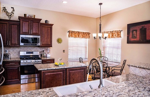 Vilano Beach House | Salt water pool - jacuzzi - BBQ - walk to beach - large screened lanai