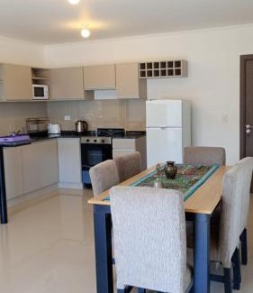 La Falda Apartment | Samsara La Falda- Depto con con cochera cubierta-piscina -AC-calefaccion-SUM-vistas a las montañas-WIFI-a 100 mts de Av principal