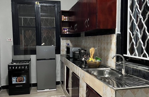 Entebbe Apartment | Sandalwood Home 4- 8min to the airport and 2 min to big shopping malls