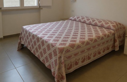 Sant'Antioco House | Sant'Antioco Red Apartment with 2-Way Air Con