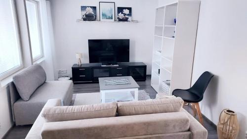 Sotkamo Apartment | Saunallinen lomakaksio Sotkamon keskustassa