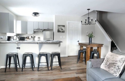 Harvie Heights Condo | Scenic Family Getaway with Hot Tub and Park Access