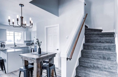 Harvie Heights Condo | Scenic Family Getaway with Hot Tub and Park Access