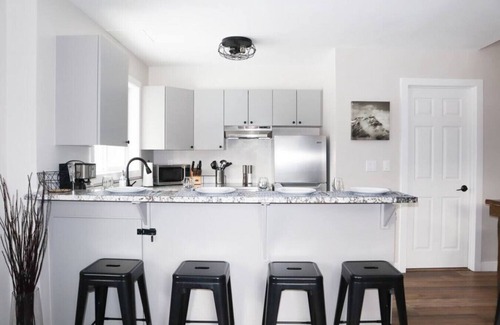 Harvie Heights Condo | Scenic Family Getaway with Hot Tub and Park Access