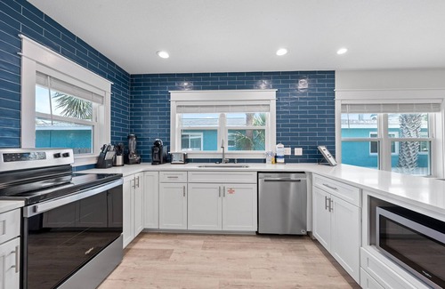 Kiska Beach House | Scenic Stays coastal 3-bedroom home just steps from the beach with a pool!
