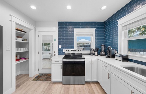 Kiska Beach House | Scenic Stays coastal 3-bedroom home just steps from the beach with a pool!