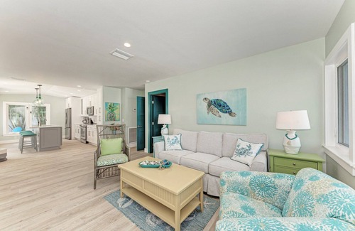 Holmes Beach House | Sea La Vie: 1.5 Blocks to Beach, Pool, Tropical Backyard & Pool by Anna Maria Life Vacation Rentals