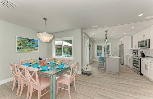 Holmes Beach House | Sea La Vie: 1.5 Blocks to Beach, Pool, Tropical Backyard & Pool by Anna Maria Life Vacation Rentals