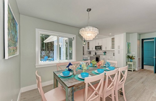 Holmes Beach House | Sea La Vie: 1.5 Blocks to Beach, Pool, Tropical Backyard & Pool by Anna Maria Life Vacation Rentals