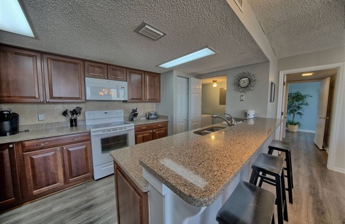 West Panama City Beach Condo | Seachase W404 2 Bed 2 Bath Pet Friendly Beach Chair Service for 4 included