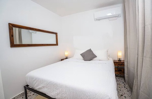 Cerro Gordo Hotel | Seaside Sanctuary: Bright & Airy 2BR by the Beach