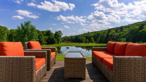 Austerlitz House | Secluded Berkshires Estate Private PondPoolTheater Gym Sunny Pond