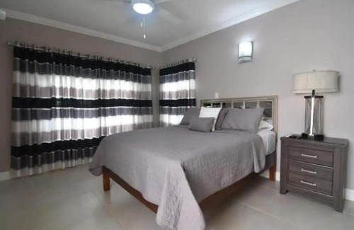 Saint Andrew Apartment | Secluded Ravinia Gem in Kingston 6