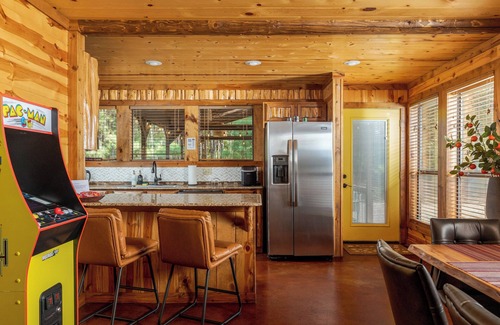 Hochatown Cabin | Secluded Stylish Cabin - Large Patio, Hot Tub, Fire Pit, Arcade, Pets OK