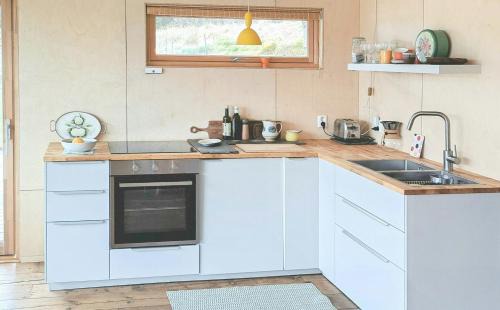 Hyllestad House | Self-Built Cabin With Views Over Leirvik