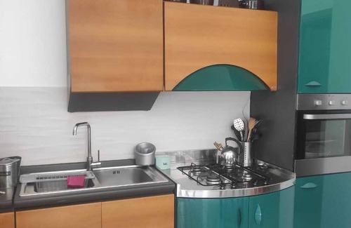 Isola delle Femmine Apartment | Self-contained apartment with outdoor patio within walking distance of the sea and downtown.