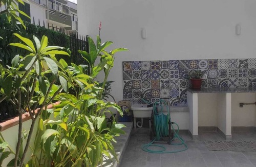 Isola delle Femmine Apartment | Self-contained apartment with outdoor patio within walking distance of the sea and downtown.