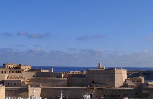 Senglea Apartment | Semi-basement, cosy apartment interconnected to our residence a traditional Maltese townhouse