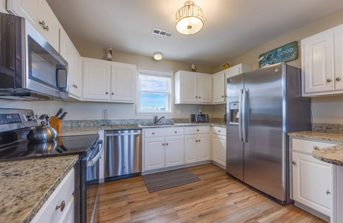 Ocean Isle Estates House | Semi-Oceanfront Home in Avon with Hot Tub, Smart TVs, and Basketball Hoop