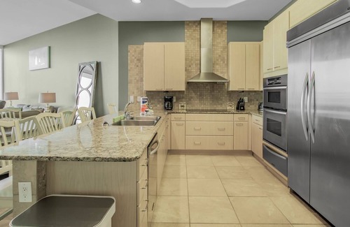 Orange Beach East House | Sensational water view condo with pools and marina