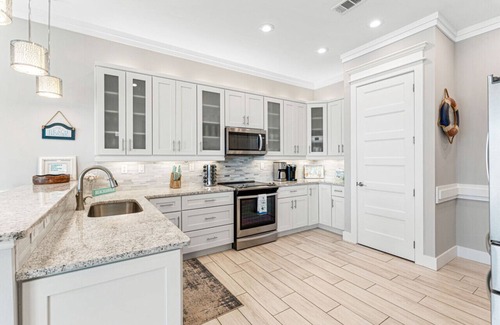 Navarre Beach House | Serendipity Beach Cottage: Spectacular Home with Pool, Golf Cart and Elevator!