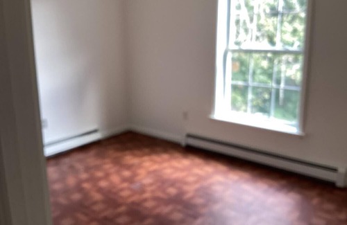Black Rock Historic District House | Serene 3-bedroom duplex in Bridgeport updated floors new appliance