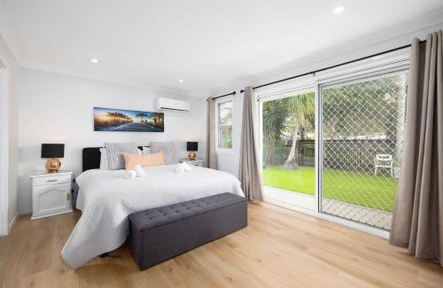 Southport House | Serene Southport Getaway Walk to Beach Shops