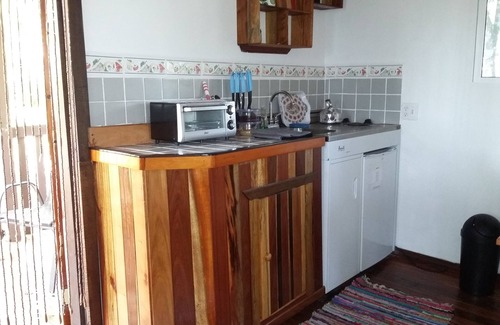 Unitedville Cabin | Set in the jungle, Ginger Lily is a self catering 1 bedroom cabin featuring A/C