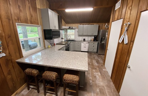 Geneva House | Shore Thing Waterfront Home with private covered boat dock on Toledo Bend