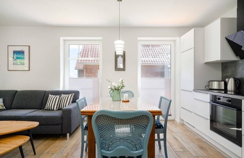 Eilsum Apartment | Sielkieker - Neue 72qm Ferienwohnung für 4 Personen mit Terrasse Direkt am Wasser