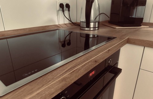 Igstadt Apartment | Sit back and relax - in this quiet, stylish accommodation