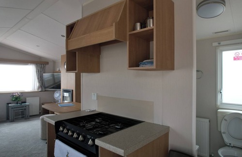 Kinmel Bay Cabin | Six Berth- Pet Friendly please ask ,Free WiFi ,Private secure decking,- Sea front with amazing views, Not to be missed