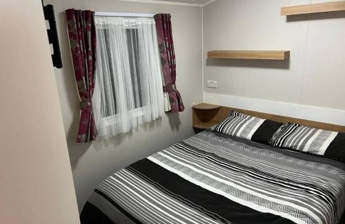 Kinmel Bay House | Six Berth- Pet Friendly please ask Free WiFi Private secure decking - Sea front with amazing views Not to be missed