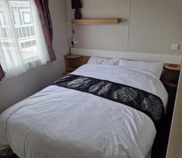 Kinmel Bay House | Six Berth- Pet Friendly please ask Free WiFi Private secure decking - Sea front with amazing views Not to be missed